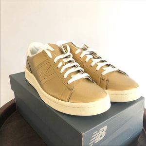 NWOT REPOSHING- New Balance Leather Gold Sneakers